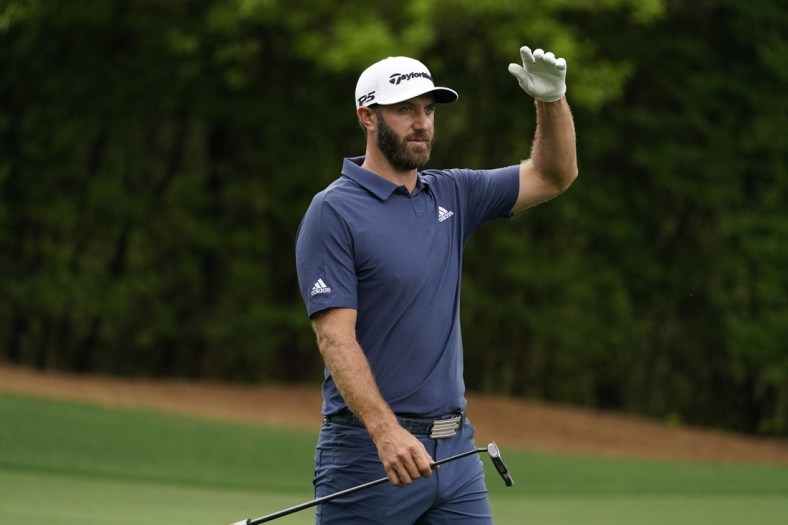 Apr 9, 2021; Augusta, Georgia, USA; Dustin Johnson walks on the 11th hole during the second round of The Masters golf tournament. Mandatory Credit: Rob Schumacher-USA TODAY Sports