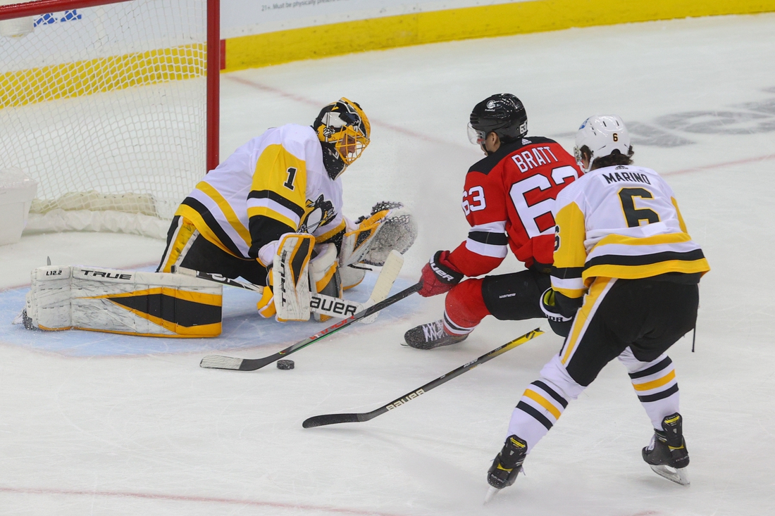Bryan Rust, Sidney Crosby lead Pittsburgh Penguins past New Jersey Devils 