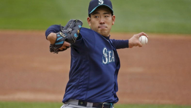 Apr 10, 2021; Minneapolis, Minnesota, USA; Seattle Mariners starting pitcher Yusei Kikuchi (18) pitches to a Minnesota Twins batter during the second inning at Target Field. Mandatory Credit: Bruce Kluckhohn-USA TODAY Sports