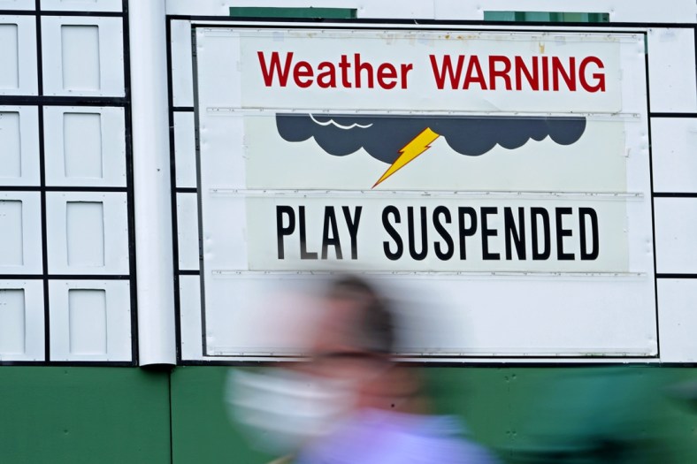 Apr 10, 2021; Augusta, Georgia, USA; A leaderboard shows that play has been suspended during the third round of The Masters golf tournament. Mandatory Credit: Michael Madrid-USA TODAY Sports