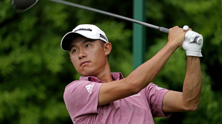 Apr 10, 2021; Augusta, Georgia, USA; Collin Morikawa plays his shot from the 14th tee during the third round of The Masters golf tournament. Mandatory Credit: Rob Schumacher-USA TODAY Sports