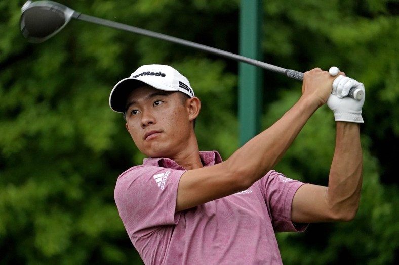 Apr 10, 2021; Augusta, Georgia, USA; Collin Morikawa plays his shot from the 14th tee during the third round of The Masters golf tournament. Mandatory Credit: Rob Schumacher-USA TODAY Sports