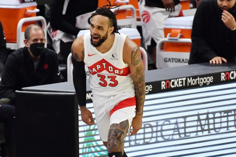 Apr 10, 2021; Cleveland, Ohio, USA; Toronto Raptors guard Gary Trent Jr. (33) reacts after hitting a three point basket against the Cleveland Cavaliers during the second quarter at Rocket Mortgage FieldHouse. Mandatory Credit: Ken Blaze-USA TODAY Sports