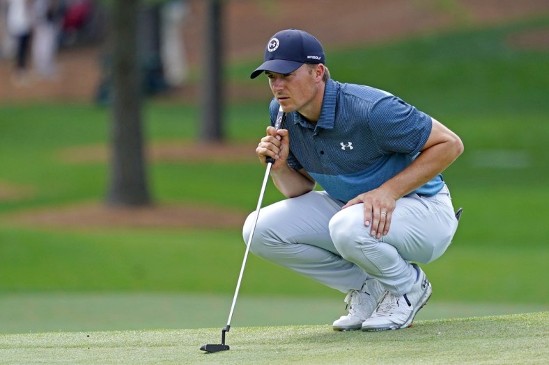 Apr 11, 2021; Augusta, Georgia, USA; Jordan Spieth lines up his putt on the seventh green during the final round of The Masters golf tournament. Mandatory Credit: Michael Madrid-USA TODAY Sports