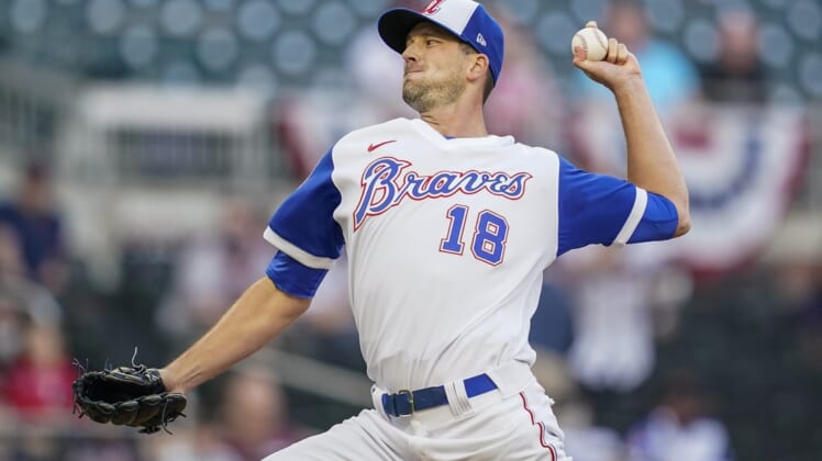 Apr 11, 2021; Cumberland, Georgia, USA; Atlanta Braves starting pitcher Drew Smyly (18) pitches against the Philadelphia Phillies during the first inning at Truist Park. Mandatory Credit: Dale Zanine-USA TODAY Sports
