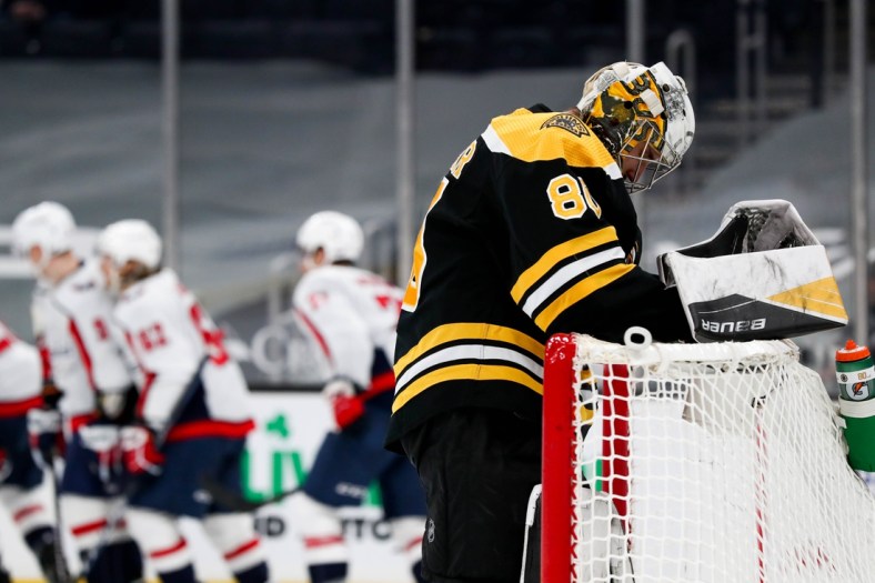 Apr 11, 2021; Boston, Massachusetts, USA; Boston Bruins goalie Dan Vladar (80) reacts after a goal during the second period against the Washington Capitals at TD Garden. Mandatory Credit: Paul Rutherford-USA TODAY Sports