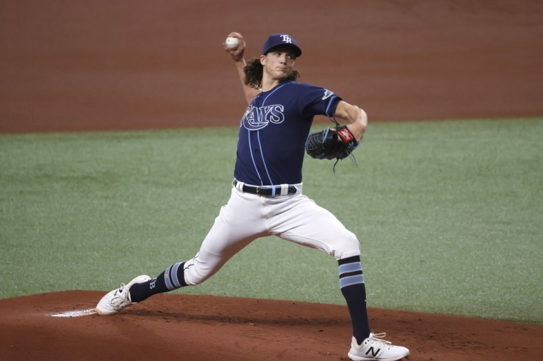 Apr 12, 2021; St. Petersburg, Florida, USA;  Tampa Bay Rays starting pitcher Tyler Glasnow (20) throws against the Texas Rangers during the first inning at Tropicana Field. Mandatory Credit: Kim Klement-USA TODAY Sports