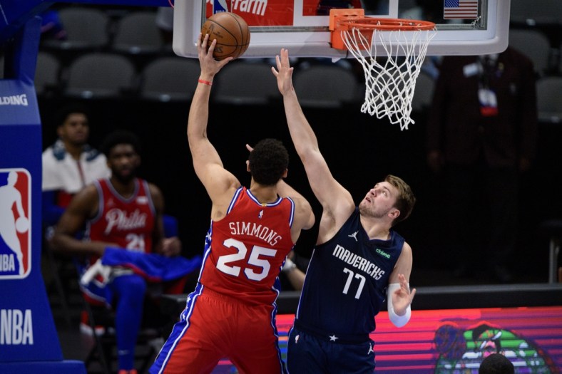 Apr 12, 2021; Dallas, Texas, USA; Dallas Mavericks guard Luka Doncic (77) guards Philadelphia 76ers guard Ben Simmons (25) during the first quarter at the American Airlines Center. Mandatory Credit: Jerome Miron-USA TODAY Sports