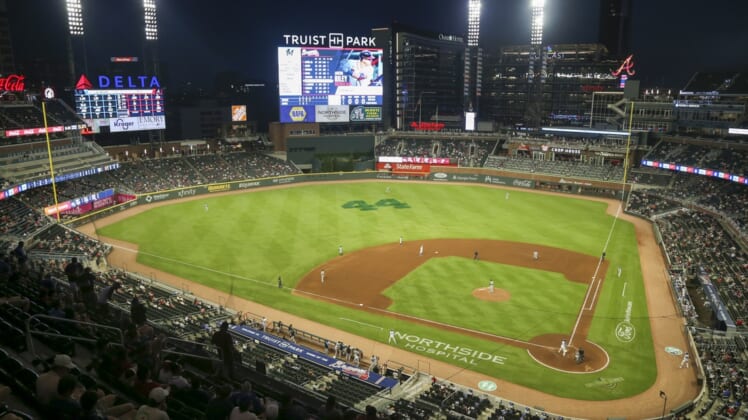 Apr 12, 2021; Atlanta, Georgia, USA; A general view of the number 44 on the outfield grass honoring the legacy of Atlanta Braves outfielder Hank Aaron (44) during a game against the Miami Marlins in the fourth inning at Truist Park. Mandatory Credit: Brett Davis-USA TODAY Sports