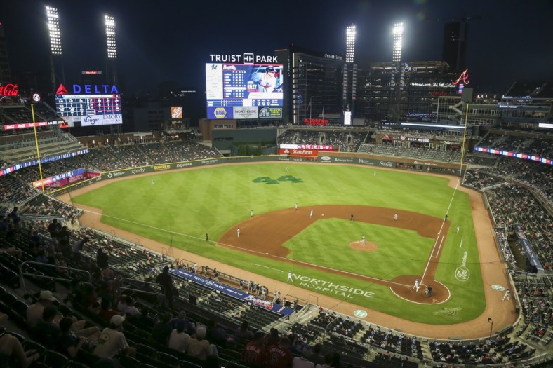 Apr 12, 2021; Atlanta, Georgia, USA; A general view of the number 44 on the outfield grass honoring the legacy of Atlanta Braves outfielder Hank Aaron (44) during a game against the Miami Marlins in the fourth inning at Truist Park. Mandatory Credit: Brett Davis-USA TODAY Sports