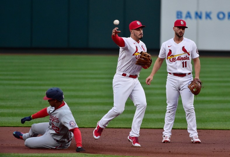 Apr 12, 2021; St. Louis, Missouri, USA;  St. Louis Cardinals third baseman Nolan Arenado (28) forces out Washington Nationals right fielder Juan Soto (22) and throws to first to complete the double play during the first inning at Busch Stadium. Mandatory Credit: Jeff Curry-USA TODAY Sports
