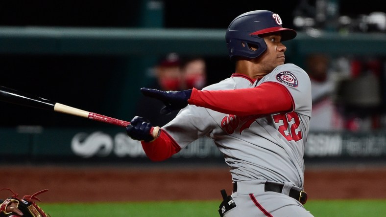 Apr 12, 2021; St. Louis, Missouri, USA;  Washington Nationals right fielder Juan Soto (22) hits a single during the sixth inning against the St. Louis Cardinals at Busch Stadium. Mandatory Credit: Jeff Curry-USA TODAY Sports