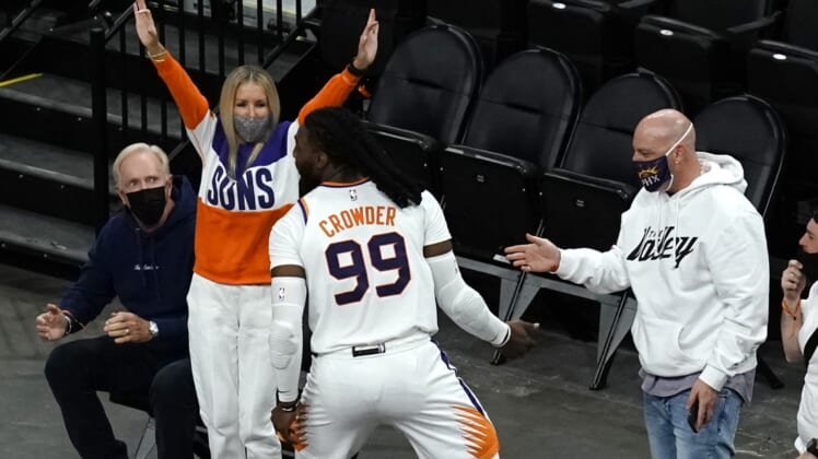 Apr 12, 2021; Phoenix, Arizona, USA; Phoenix Suns forward Jae Crowder (99) celebrates with the fans after scoring against the Houston Rockets in the first half at Phoenix Suns Arena. Mandatory Credit: Rick Scuteri-USA TODAY Sports