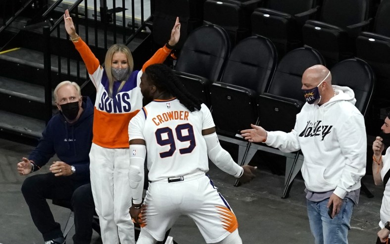 Apr 12, 2021; Phoenix, Arizona, USA; Phoenix Suns forward Jae Crowder (99) celebrates with the fans after scoring against the Houston Rockets in the first half at Phoenix Suns Arena. Mandatory Credit: Rick Scuteri-USA TODAY Sports