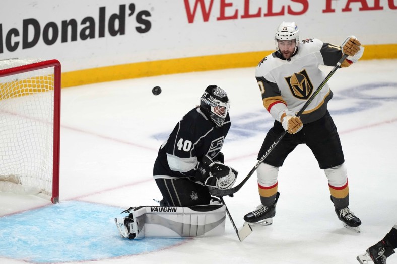 Apr 12, 2021; Los Angeles, California, USA; LA Kings goaltender Calvin Petersen (40) defends the goal against Vegas Golden Knights center Nicolas Roy (10) in the second period at Staples Center. Mandatory Credit: Kirby Lee-USA TODAY Sports