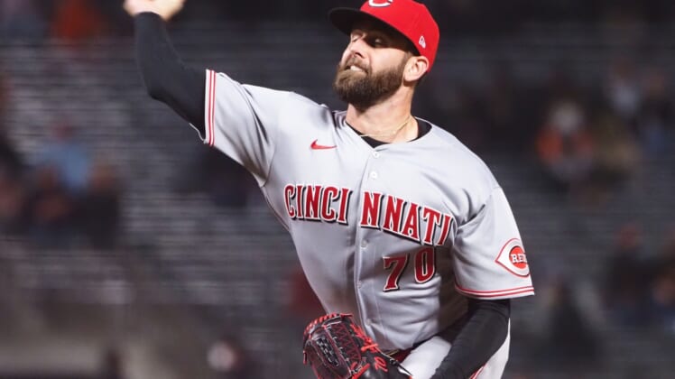 Apr 12, 2021; San Francisco, California, USA; Cincinnati Reds relief pitcher Tejay Antone (70) pitches the ball against the San Francisco Giants during the eighth inning at Oracle Park. Mandatory Credit: Kelley L Cox-USA TODAY Sports