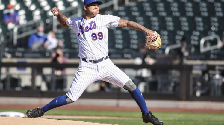 Apr 13, 2021; New York City, New York, USA; New York Mets pitcher Taijuan Walker (99) pitches in the first inning against the Philadelphia Phillies at Citi Field. Mandatory Credit: Wendell Cruz-USA TODAY Sports