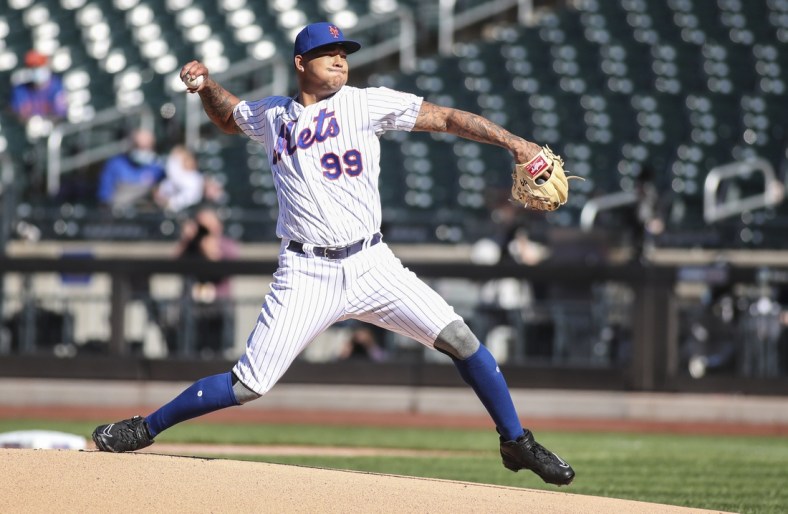 Apr 13, 2021; New York City, New York, USA; New York Mets pitcher Taijuan Walker (99) pitches in the first inning against the Philadelphia Phillies at Citi Field. Mandatory Credit: Wendell Cruz-USA TODAY Sports