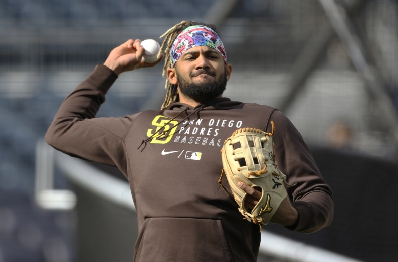 Apr 13, 2021; Pittsburgh, Pennsylvania, USA;  San Diego Padres shortstop Fernando Tatis Jr. (23) plays catch on the field before the game against the Pittsburgh Pirates at PNC Park. Mandatory Credit: Charles LeClaire-USA TODAY Sports