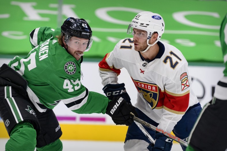Apr 13, 2021; Dallas, Texas, USA; Dallas Stars defenseman Sami Vatanen (45) defends against Florida Panthers center Alex Wennberg (21) during the first period at the American Airlines Center. Mandatory Credit: Jerome Miron-USA TODAY Sports