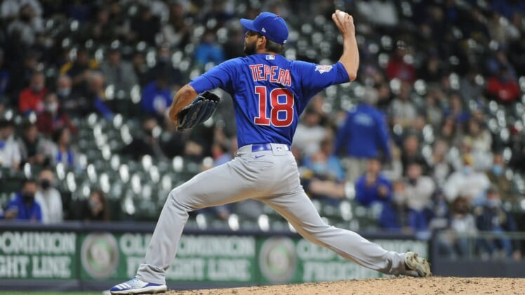 Apr 13, 2021; Milwaukee, Wisconsin, USA; Chicago Cubs relief pitcher Ryan Tepera (18) pitches during the fifth inning against the Milwaukee Brewers at American Family Field. Mandatory Credit: Michael McLoone-USA TODAY Sports