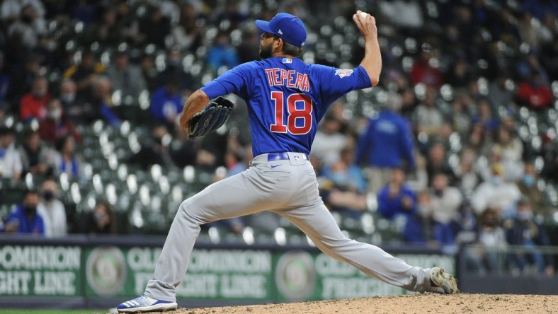 Apr 13, 2021; Milwaukee, Wisconsin, USA; Chicago Cubs relief pitcher Ryan Tepera (18) pitches during the fifth inning against the Milwaukee Brewers at American Family Field. Mandatory Credit: Michael McLoone-USA TODAY Sports