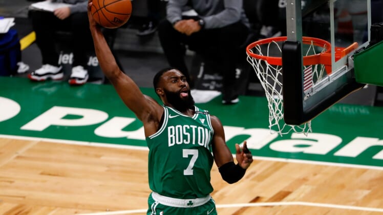 Apr 7, 2021; Boston, Massachusetts, USA; Boston Celtics guard Jaylen Brown (7) goes in for a dunk during the fourth quarter against the New York Knicks at TD Garden. Mandatory Credit: Winslow Townson-USA TODAY Sports