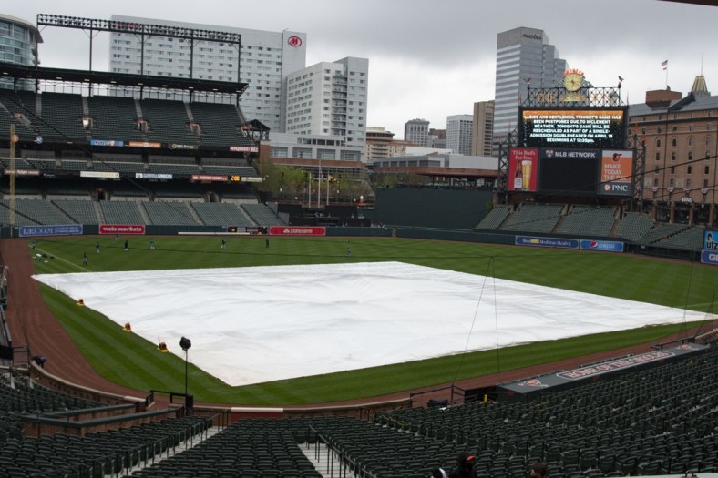 Apr 14, 2021; Baltimore, Maryland, USA;  The game between the Seattle Mariners at Baltimore Orioles has been postponed due to inclement weather at Oriole Park at Camden Yards. Mandatory Credit: Tommy Gilligan-USA TODAY Sports