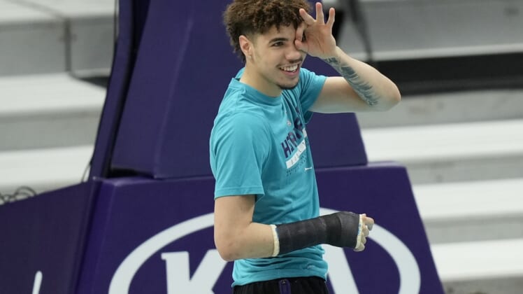 Apr 14, 2021; Charlotte, North Carolina, USA; Charlotte Hornets guard LaMelo Ball (2) on the court during pre game shoot a round before the game against the Cleveland Cavaliers at the Spectrum Center. Mandatory Credit: Jim Dedmon-USA TODAY Sports