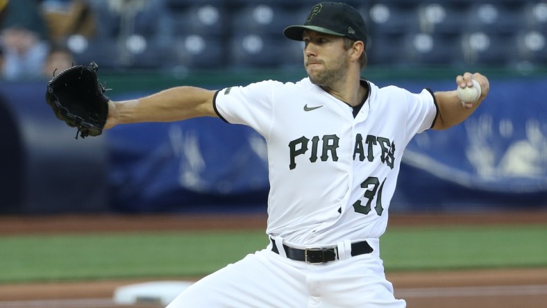 Apr 14, 2021; Pittsburgh, Pennsylvania, USA; Pittsburgh Pirates starting pitcher Tyler Anderson (31) pitches against the San Diego Padres during the first inning at PNC Park. Mandatory Credit: Charles LeClaire-USA TODAY Sports