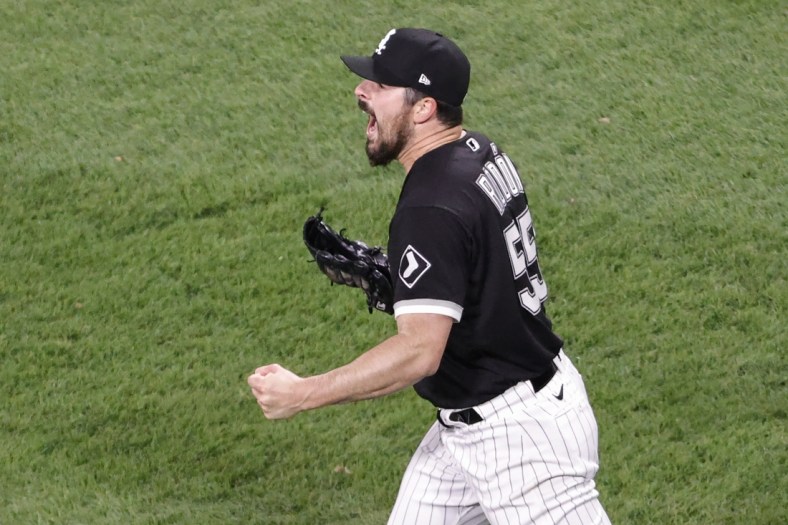 Apr 14, 2021; Chicago, Illinois, USA; Chicago White Sox starting pitcher Carlos Rodon (55) reacts after delivering a final out against the Cleveland Indians during the ninth inning at Guaranteed Rate Field. Mandatory Credit: Kamil Krzaczynski-USA TODAY Sports