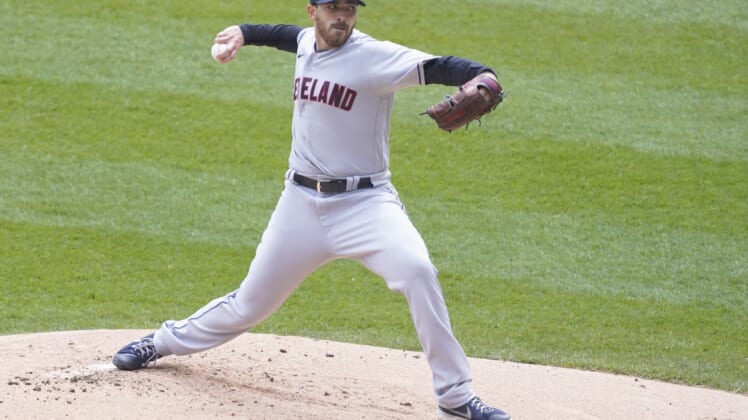 Apr 15, 2021; Chicago, Illinois, USA; Cleveland Indians starting pitcher Aaron Civale throws against the Chicago White Sox during the first inning at Guaranteed Rate Field. All players on both teams are wearing number 42 in honor of Jackie Robinson Day. Mandatory Credit: David Banks-USA TODAY Sports