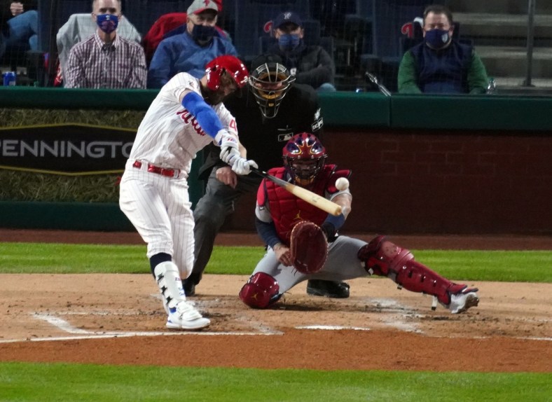 Apr 16, 2021; Philadelphia, Pennsylvania, USA; Philadelphia Phillies right fielder Bryce Harper hits a double driving in two runs in the second inning against the St. Louis Cardinals at Citizens Bank Park. Mandatory Credit: James Lang-USA TODAY Sports