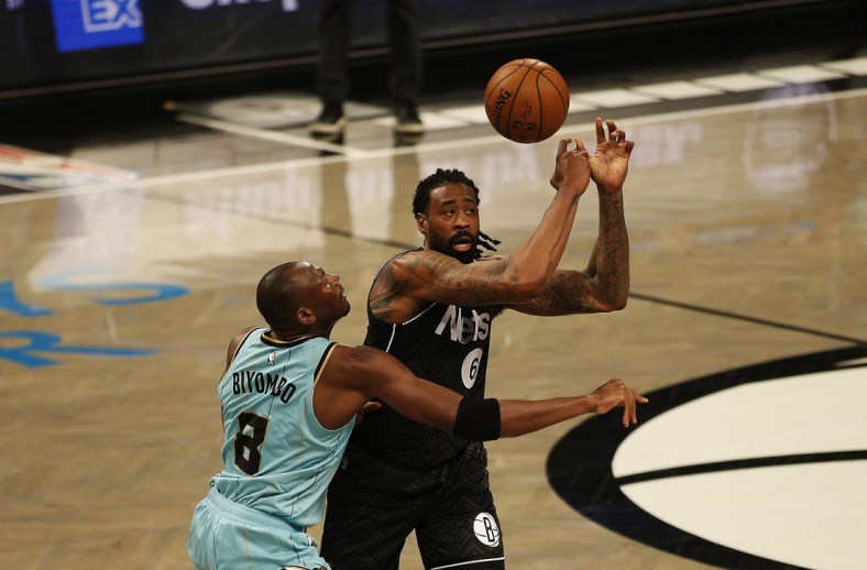 Apr 16, 2021; Brooklyn, New York, USA; Brooklyn Nets center DeAndre Jordan (6) loses the ball to Charlotte Hornets center Bismack Biyombo (8) during the first half at Barclays Center. Mandatory Credit: Andy Marlin-USA TODAY Sports