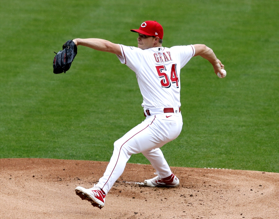 Apr 17, 2021; Cincinnati, Ohio, USA; Cincinnati Reds starting pitcher Sonny Gray (54) throws against the Cleveland Indians during the first inning at Great American Ball Park. Mandatory Credit: David Kohl-USA TODAY Sports