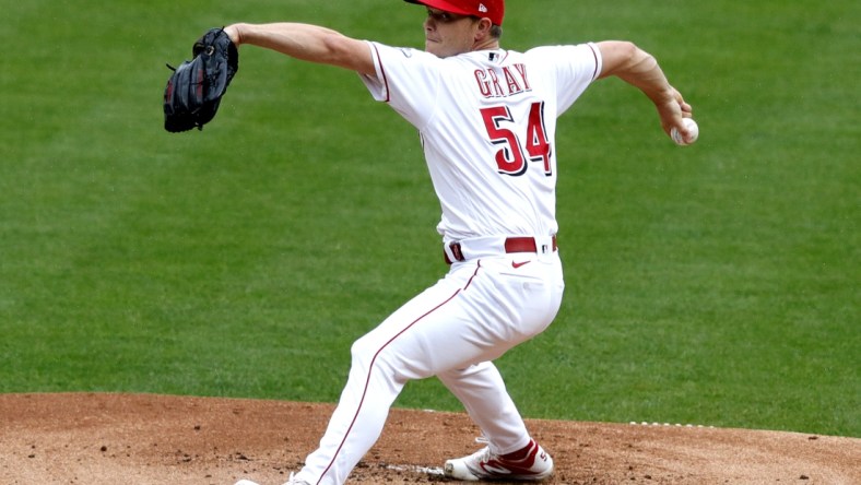 Apr 17, 2021; Cincinnati, Ohio, USA; Cincinnati Reds starting pitcher Sonny Gray (54) throws against the Cleveland Indians during the first inning at Great American Ball Park. Mandatory Credit: David Kohl-USA TODAY Sports