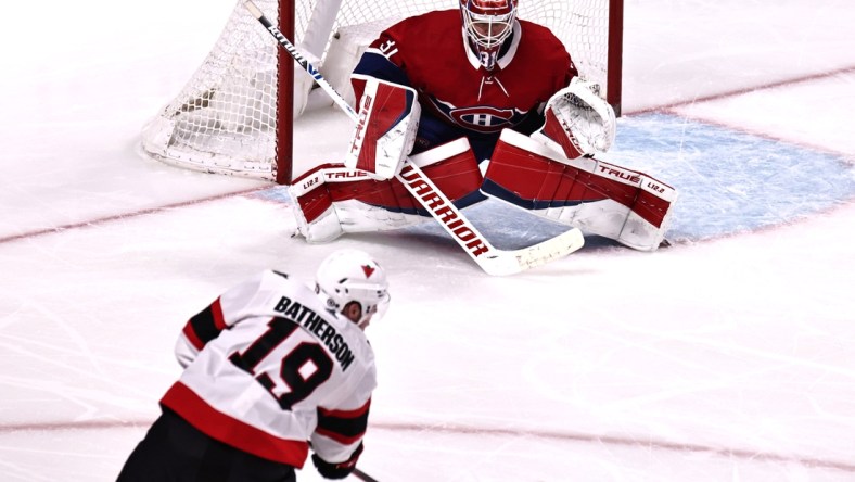 Apr 17, 2021; Montreal, Quebec, CAN; Ottawa Senators right wing Drake Batherson (19) shoots against Montreal Canadiens goaltender Carey Price (31) during the second period at Bell Centre. Mandatory Credit: Jean-Yves Ahern-USA TODAY Sports