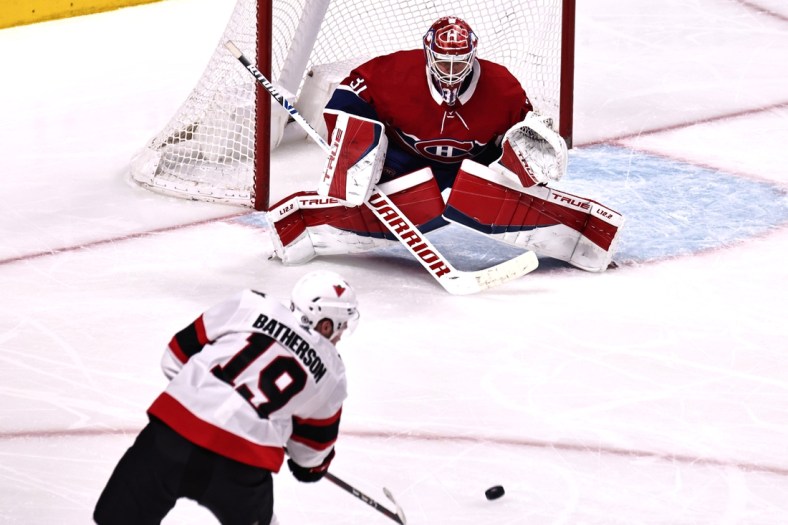 Apr 17, 2021; Montreal, Quebec, CAN; Ottawa Senators right wing Drake Batherson (19) shoots against Montreal Canadiens goaltender Carey Price (31) during the second period at Bell Centre. Mandatory Credit: Jean-Yves Ahern-USA TODAY Sports