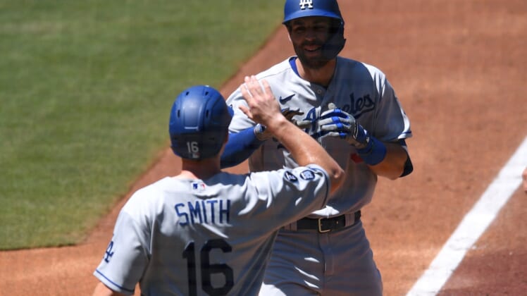 Apr 18, 2021; San Diego, California, USA; Los Angeles Dodgers center fielder fielder Chris Taylor (R) is congratulated by catcher Will Smith (16) after hitting a two-run home run during the second inning against the San Diego Padres at Petco Park. Mandatory Credit: Orlando Ramirez-USA TODAY Sports