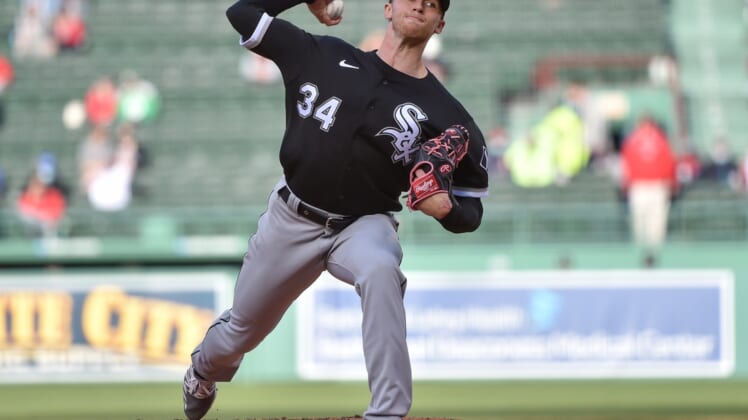 Apr 18, 2021; Boston, Massachusetts, USA; Chicago White Sox starting pitcher Michael Kopech (34) pitches during the first inning in game 2 against the Boston Red Sox at Fenway Park. Mandatory Credit: Bob DeChiara-USA TODAY Sports