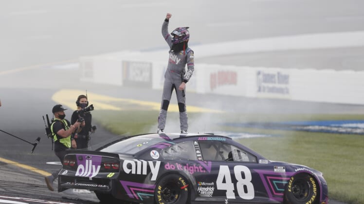 Apr 18, 2021; Richmond, Virginia, USA; NASCAR Cup Series driver Alex Bowman (48) celebrates after winning the Toyota Owners 400 at Richmond International Raceway. Mandatory Credit: Amber Searls-USA TODAY Sports