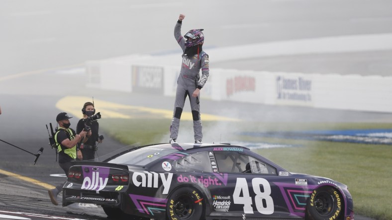 Apr 18, 2021; Richmond, Virginia, USA; NASCAR Cup Series driver Alex Bowman (48) celebrates after winning the Toyota Owners 400 at Richmond International Raceway. Mandatory Credit: Amber Searls-USA TODAY Sports