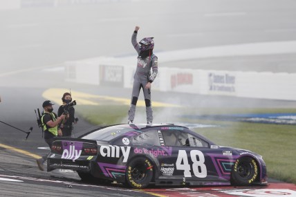 Apr 18, 2021; Richmond, Virginia, USA; NASCAR Cup Series driver Alex Bowman (48) celebrates after winning the Toyota Owners 400 at Richmond International Raceway. Mandatory Credit: Amber Searls-USA TODAY Sports