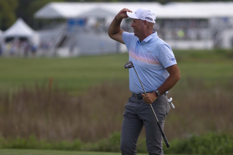 Apr 18, 2021; Hilton Head, South Carolina, USA; Stewart Cink reacts on the green of the eighteenth hole after winning the 2021 RBC Heritage golf tournament. Mandatory Credit: Joshua S. Kelly-USA TODAY Sports