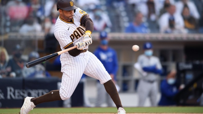 Apr 17, 2021; San Diego, California, USA; San Diego Padres left fielder Tommy Pham (28) bats during the second inning against the Los Angeles Dodgers at Petco Park. Mandatory Credit: Orlando Ramirez-USA TODAY Sports