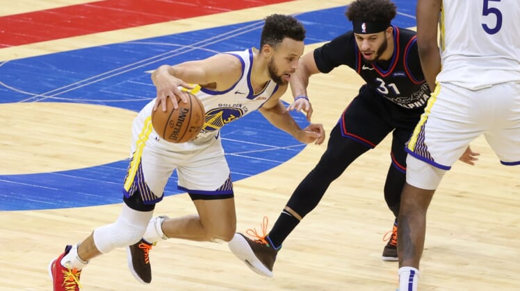 Apr 19, 2021; Philadelphia, Pennsylvania, USA; Golden State Warriors guard Stephen Curry (30) drives past Philadelphia 76ers guard Seth Curry (31) during the second quarter at Wells Fargo Center. Mandatory Credit: Bill Streicher-USA TODAY Sports