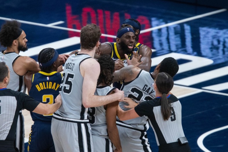 Apr 19, 2021; Indianapolis, Indiana, USA; Indiana Pacers forward JaKarr Sampson (14) and San Antonio Spurs forward Rudy Gay (22) get into a shoving fight in the fourth quarter at Bankers Life Fieldhouse. Mandatory Credit: Trevor Ruszkowski-USA TODAY Sports