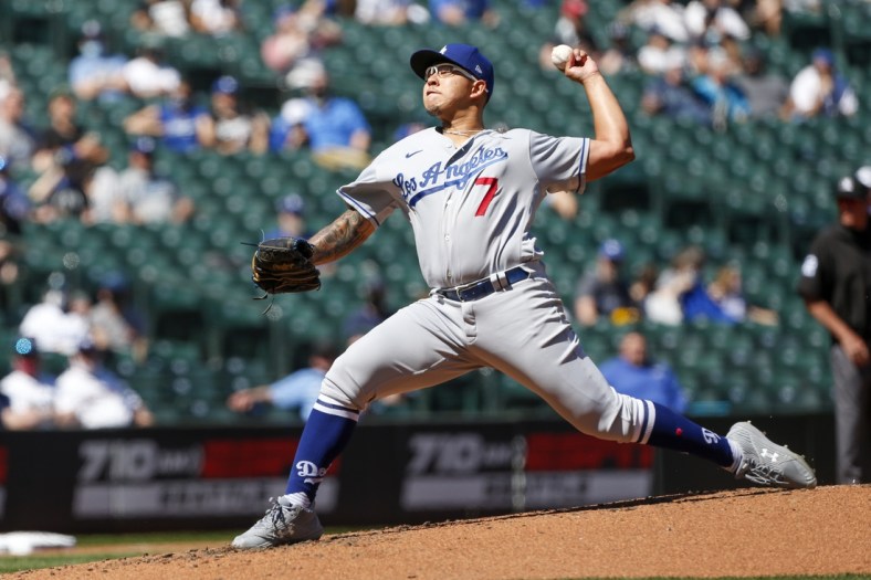 Apr 20, 2021; Seattle, Washington, USA; Los Angeles Dodgers starting pitcher Julio Urias (7) throws against the Seattle Mariners during the third inning at T-Mobile Park. Mandatory Credit: Joe Nicholson-USA TODAY Sports