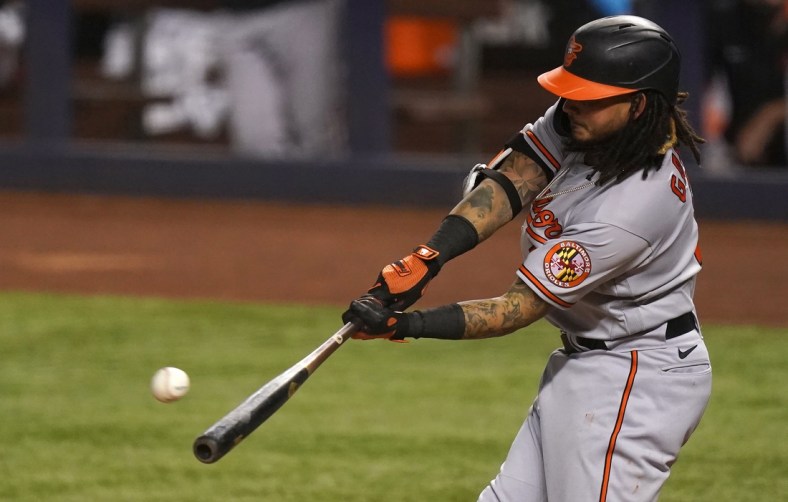 Apr 20, 2021; Miami, Florida, USA; Baltimore Orioles shortstop Freddy Galvis (2) connects for a solo homerun in the 3rd inning against the Miami Marlins at loanDepot park. Mandatory Credit: Jasen Vinlove-USA TODAY Sports