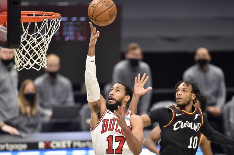 Apr 21, 2021; Cleveland, Ohio, USA; Chicago Bulls forward Garrett Temple (17) drives against Cleveland Cavaliers guard Darius Garland (10) in the second quarter at Rocket Mortgage FieldHouse. Mandatory Credit: David Richard-USA TODAY Sports
